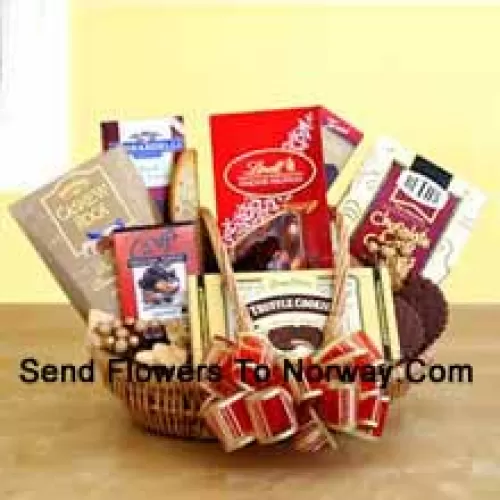 Satisfy her sweet tooth this year with a gift dedicated to chocolate indulgence! Our wicker basket comes brimming with a vast array of gourmet treats, all celebrating the many reasons to love chocolate. Its sweet excess includes Beth's chocolate chip cookies, English toffee, Chocolate truffle cookies, biscotti, Lindt truffles, Cashew Roca and a Ghirardelli chocolate bar. (Please Note That We Reserve The Right To Substitute Any Product With A Suitable Product Of Equal Value In Case Of Non-Availability Of A Certain Product)